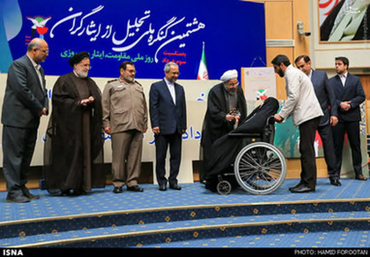 تجلیل از ایثارگران با حضور دکتر روحانی به روایت تصویر