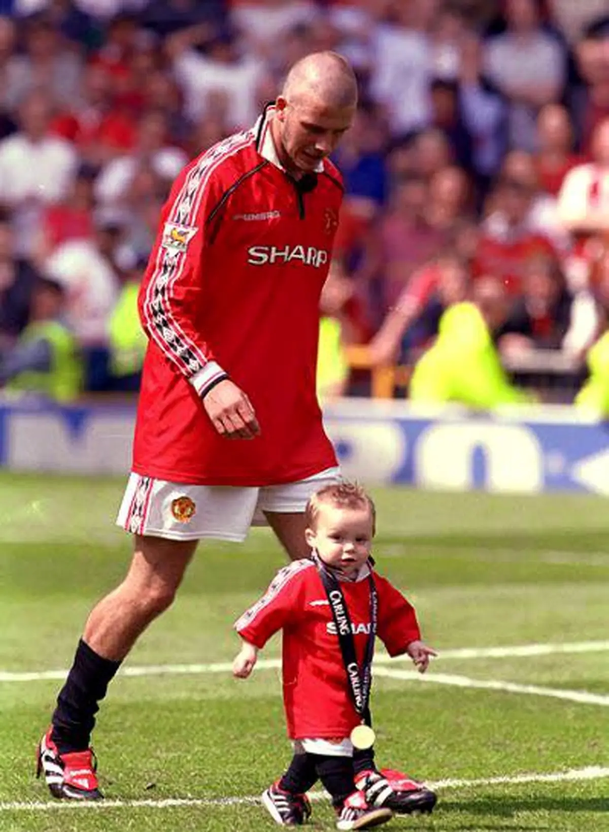 تصویر جالب بکهام و پسرش+ عکس