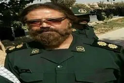 صحنه ای عجیب از همسر شهید مدافع حرم مقابل تابوت شوهرش+ تصویر