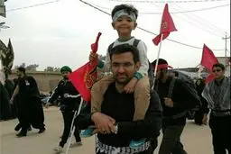 تصویری از آقای وزیر و فرزندش در پیاده روی اربعین