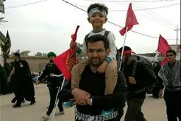 تصویری از آقای وزیر و فرزندش در پیاده روی اربعین