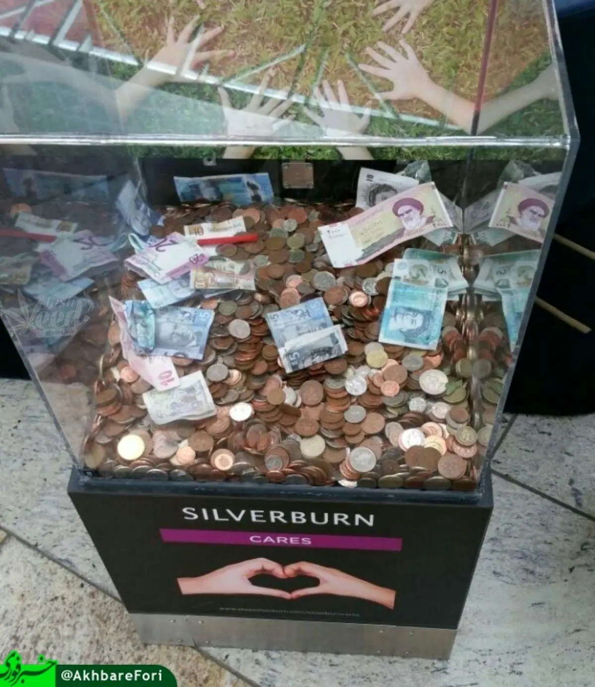 دویست تومنی در صندوق صدقه گلاسکو اسکاتلند/عکس