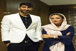 دروازه‌بان تیم ملی کنار بهاره افشاری در یک مراسم