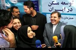 خوش‌و‌بش آخوندی با خبرنگاران در حاشیه یک همایش/عکس
