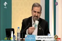 محسن رضایی دوباره با نمایش هزار تومانی مناظره را آغاز کرد