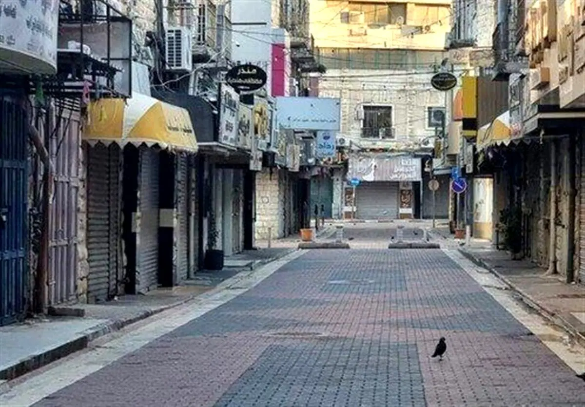 اعتصاب سراسری در کرانه باختری بعد از جنایت هولناک اشغالگران در بیمارستان غزه