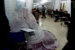 حضور در جلسه امتحان با لباس عروس/عکس
