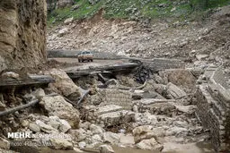 بازگشایی و ترمیم راه‌ ارتباطی پلدختر - معمولان/ تصاویر