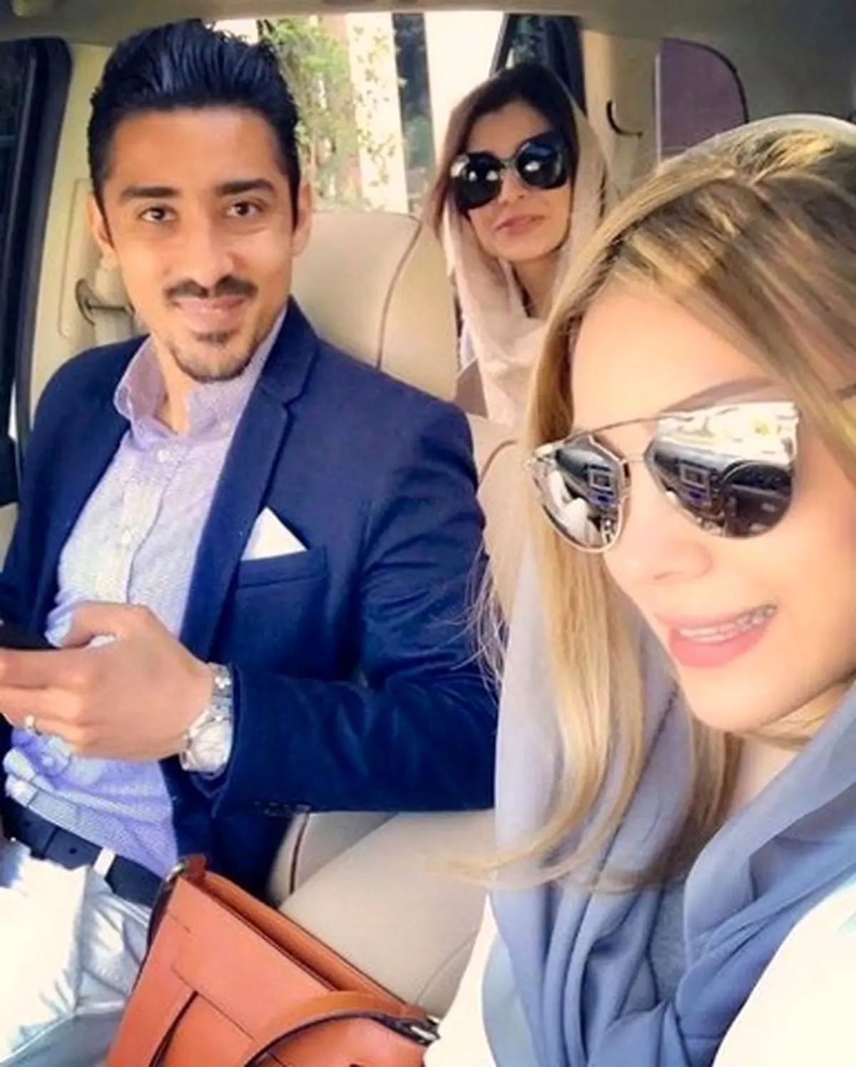 تصویری از رضا قوچان نژاد و همسرش در هلند