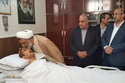 عیادت وزیر دادگستری از یک شهید زنده/عکس