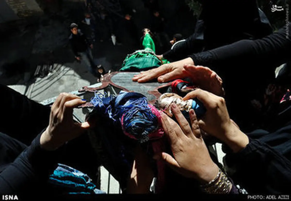 تصاویر آیین علمگردانی در روستای هزاوه