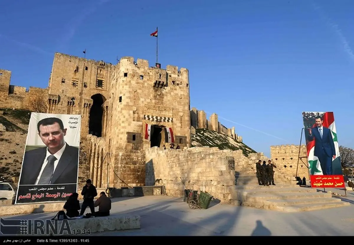 تصاویر بشار اسد بر قلعه تاریخی شهر حلب
