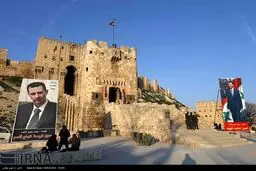 تصاویر بشار اسد بر قلعه تاریخی شهر حلب