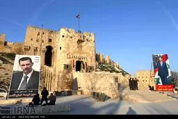 تصاویر بشار اسد بر قلعه تاریخی شهر حلب