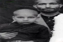 کودکی حسن روحانی در آغوش پدرش/عکس