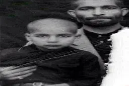کودکی حسن روحانی در آغوش پدرش/عکس