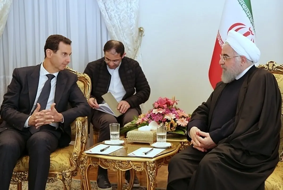 خبر مهم/ جنجال در سوریه بر سر نبود پرچم این کشور در جریان استقبال از اسد در ایران + عکس