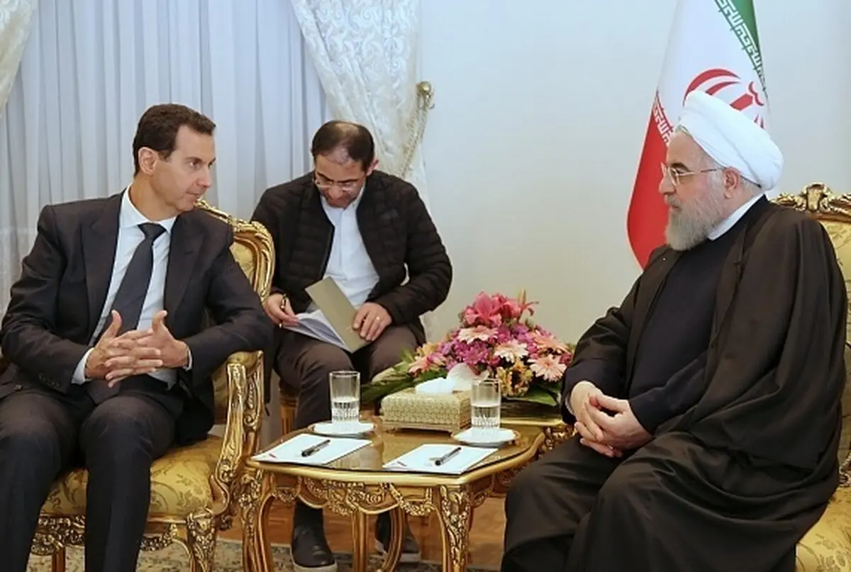 خبر مهم/ جنجال در سوریه بر سر نبود پرچم این کشور در جریان استقبال از اسد در ایران + عکس