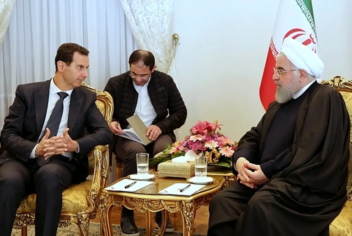 خبر مهم/ جنجال در سوریه بر سر نبود پرچم این کشور در جریان استقبال از اسد در ایران + عکس