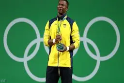 قهرمانی که پس از کسب طلا با ورزش خداحافظی کرد/عکس