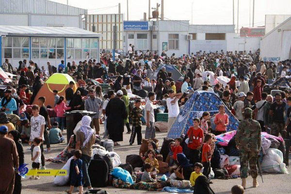 بازگشت بی سابقه مهاجران افغان از ایران + عکس