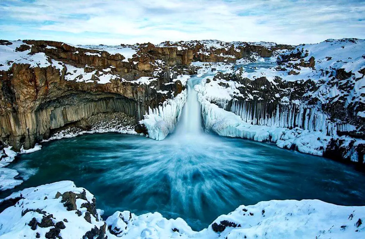 عکس روز به انتخاب نشنال جئوگرافیک آبشار یخ زده، ایسلند