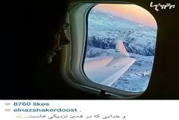 الناز شاکردوست در حال تماشای منظره زمستانی از پنجره هواپیما/عکس