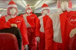 لباس های عجیب مهمانداران هواپیما در دوران کرونا + عکس