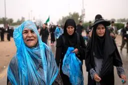 پیاده‎روی اربعین زیر باران / تصاویر