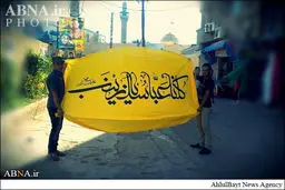 پرچم مدافعان حرم در جوار حرم حضرت زینب(س)