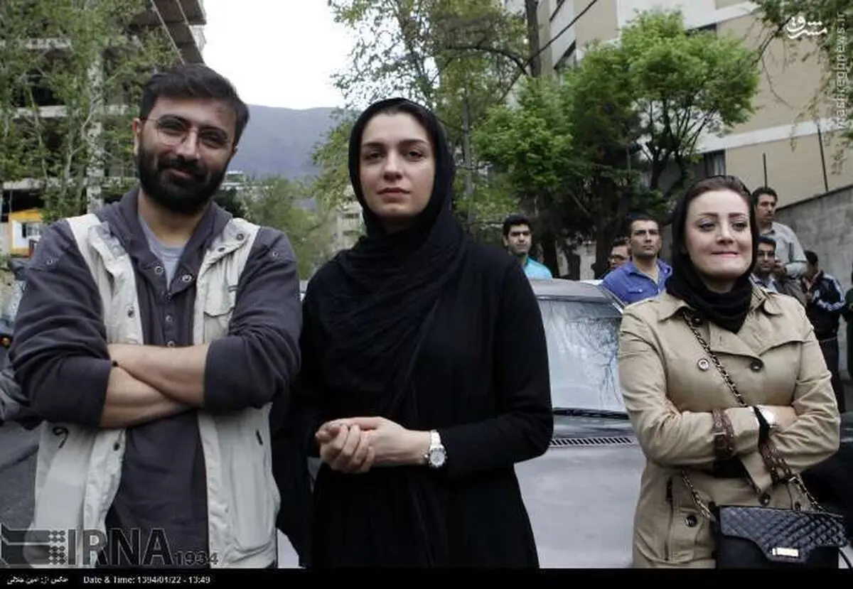 امین زندگانی و همسرش در تجمع مقابل سفارت عربستان/عکس