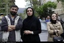امین زندگانی و همسرش در تجمع مقابل سفارت عربستان/عکس