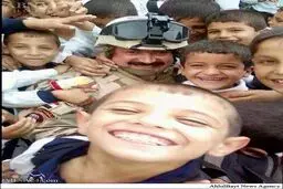 عکس سلفی کودکان تکریت با سرباز ارتش عراق
