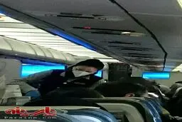 عکس:استفاده مهماندار زن از ماسک در پرواز نجف-تهران!