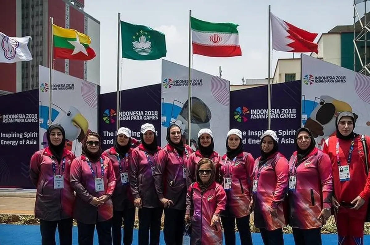 اهتزاز پرچم ایران در دهکده بازی‌های پاراآسیایی / تصاویر