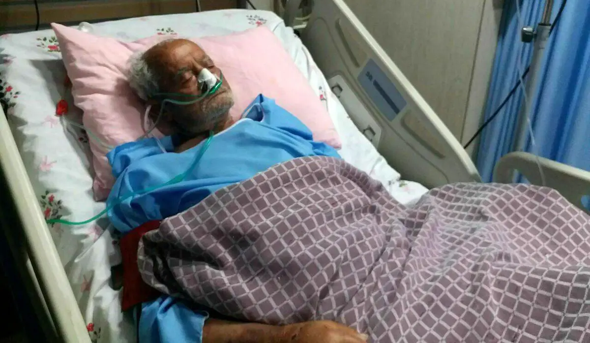 تصویری از دهقان فداکار روی تخت بیمارستان