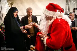هدیه بابانوئل به معاون روحانی/عکس