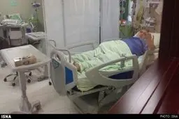 کری خوانی فتح‌الله‌زاده برای پرسپولیسی‌ها روی تخت بیمارستان + عکس