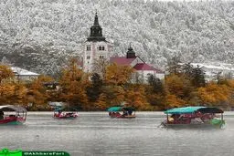 تصویری فوق العاده از پاییز برفی در دریاچه زیبای بلد در اسلوونی/عکس