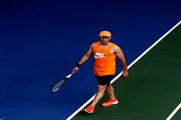 علي كريمي دست به راكت شد! + عكس