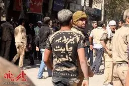 عکس/ مراسم گل مالی عاشورا در خرم آباد