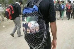 عکس سردار سلیمانی، پوتین، سید حسن نصر‌الله و سردار همدانی در مراسم راهپیمایی اربعین