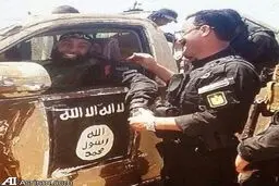 ابوعزرائیل سوار بر خودروی داعشی ها/ عکس