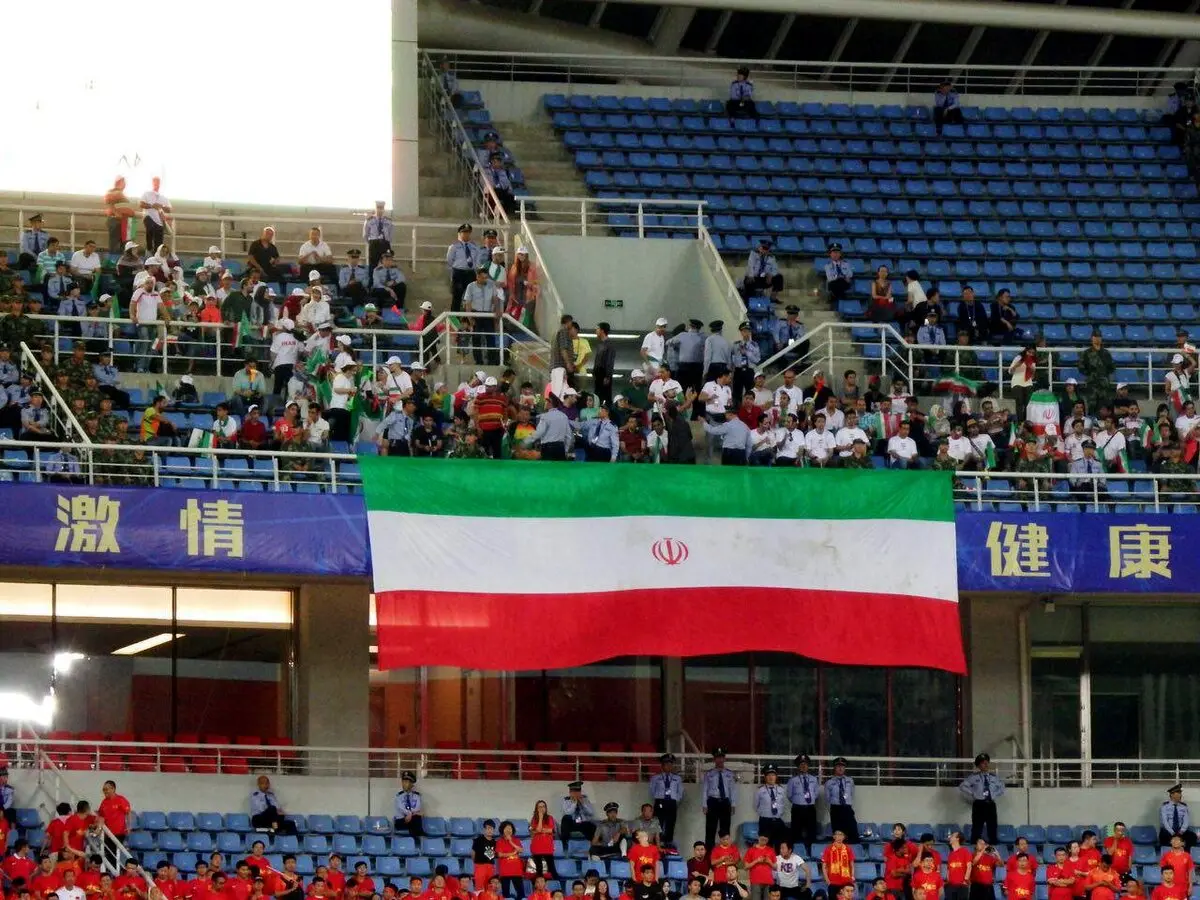 حضور هواداران ایرانی در استادیوم شین یانگ/عکس