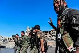 تصاویری از جشن و پایکوبی کُردها در میدان اعدام داعش