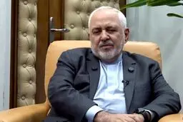 ظریف با لباس خادمی امام رضا در مراسم اربعین 