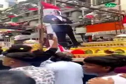 انداختن تاج گل بر عکس رهبر انقلاب و مراسم اعدام نتانیاهو در هند