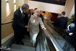 پله برقی سواری اوباما و مرکل(عکس)