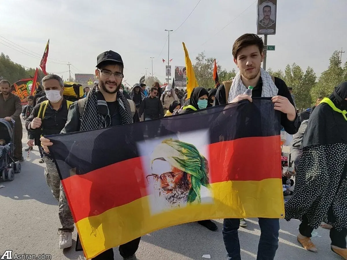 تصویر رهبر انقلاب روی پرچم آلمان/تصاویر