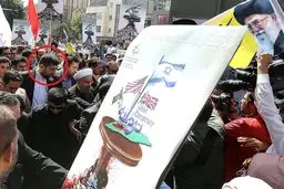 محافظ شخصی حسن نصرالله بادیگارد روحانی شد؟/ عکس